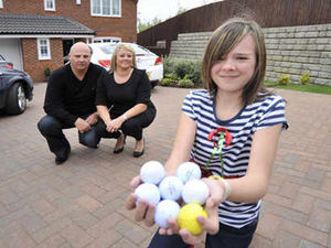 Supporting image for story: Golf balls stop play in garden