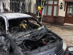 Supporting image for story: Fire crews tackle car and house fire
