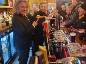 Supporting image for story: How did Robert Plant end up at a Wolverhampton pub pouring pints for footie fans? Well it's quite funny really...