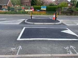 Newly installed speed bumps on Dixon Street