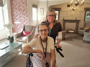 Joan Edwards, 88, the first to receive her booster jab