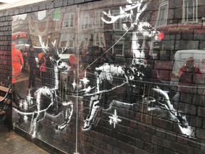 Supporting image for story: Perspex which covered Banksy artwork to be sold for charity