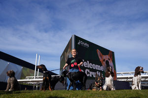 Paralympian Ellie Simmonds poses alongside a group of dogs during the official launch of Crufts Dog Show 2025 at the NEC Birmingham. PA Photo. Photo: Jacob King/PA Wire