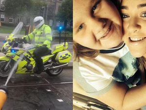 Supporting image for story: Watch this Edinburgh police officer getting soaked with a hose in the name of charity