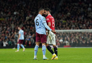 Tempers flare between Manchester United's Bruno Fernandes (right) and Aston Villa's Douglas Luiz