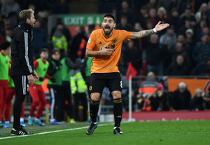 Ruben Neves of Wolverhampton Wanderers argues about a VAR decision.