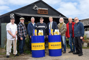 Morris Lubricants executive chairman Andrew Goddard (fourth from right) with members of Shrewsbury Men’s Shed.
