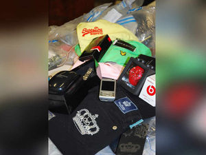Supporting image for story: £1.5m fake designer clothes seized in raid