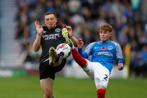 Jordan Shipley of Shrewsbury Town and Zak Swanson of Portsmouth (AMA)