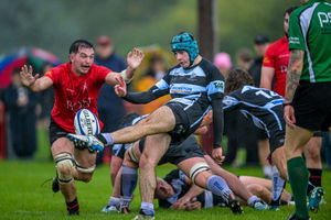 Ludlow skipper Charlie Doyle attempts to charge down the box kick of the Luctonians scrum-half (Picture: Trevor Patchett)