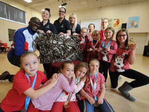 Supporting image for story: Athlete's statue teaches values of sport at Sedgley school
