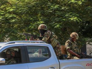 Supporting image for story: Haitian gangs open fire at UN helicopter still in flight as violence continues