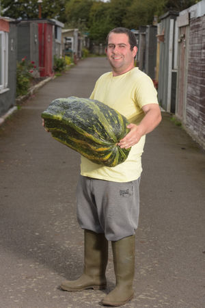 Gardening fan Chris Evans, aged 21, talks to his vegetables

