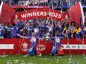 Crystal Palace players celebrate with the FA Cup