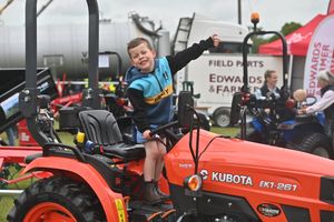 Charlie Whittcase, 5, on a tractor