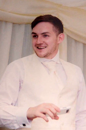 Alex Brown at his sister's wedding in 2012