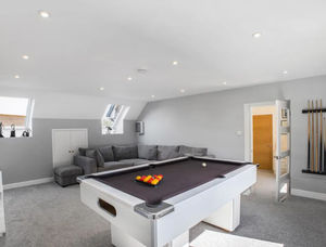 Why not play some pool after swimming in the pool