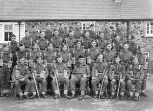 With some Army colleagues, front row, second from left.
