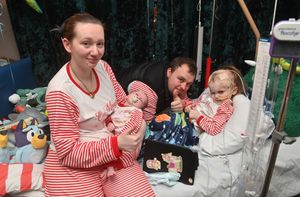 Tommy with mum, dad and sister: Romaine Lawley, Jack Martin and baby Esmerelda.
