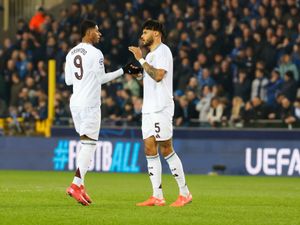 Aston Villa’s Marcus Rashford, left, and Aston Villa’s Tyrone Mings at the start of the Champions League match in Bruges