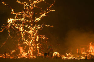 A NSW Rural Fire Service crew fights the Gospers Mountain Fire