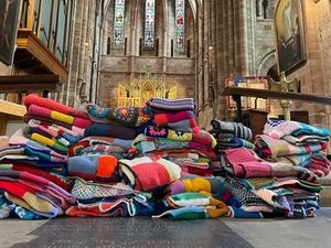 Supporting image for story: Shrewsbury Abbey knitting scheme delivers its 150th blanket to hospital