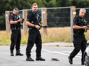 Supporting image for story: Man on roof closes road in Hednesford