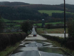 Supporting image for story: Flood drama in Shropshire and Mid Wales: Helicopter airlifts driver stuck in water and people rescued from their homes