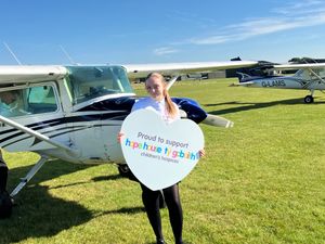 Supporting image for story: 15-year-old flying ace Isabelle soars over north Shropshire school in charity fundraiser