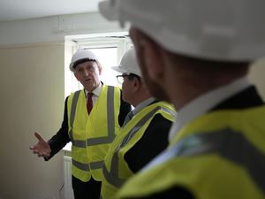 Defence Secretary John Healey during a visit to see military housing
