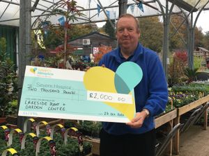 Supporting image for story: Garden centre hands over hospice donation
