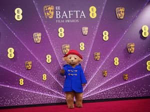 Supporting image for story: Bafta red carpet in pictures: Gorgeous gowns, stylish suits and a duffle coat