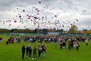 Balloons were released at the Dell Stadium on Saturday