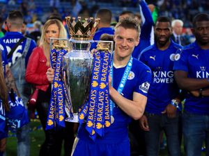 Jamie Vardy holds the Premier League trophy