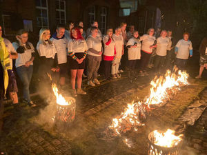 Supporting image for story: Walkers hot foot it through flames to raise money for Kidderminster hospice