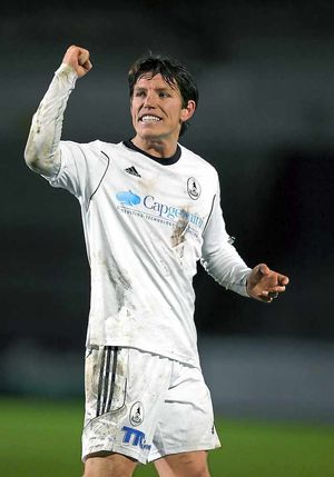 Sean Clancy of AFC Telford United celebrates his team's win at full time