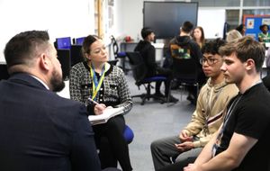 T Level students talking to Ercall Wood Academy head Nick Murphy