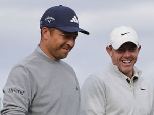 Rory McIlroy and Xander Schauffele walking on day one of the 2023 Scottish Open