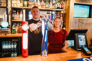 Firefighter Lee Poole joined general manager Michelle Wood to pour the first pint at the revamped Gospel Oak pub in Tipton