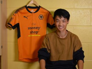 Supporting image for story: Wolves sign Swiss midfielder Ming-Yang Yang - WATCH
