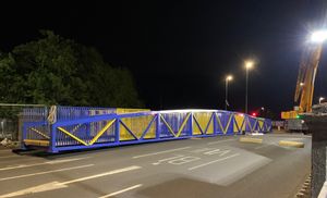 The Meole footbridge - and its blue and amber paint job - was lifted into place over the weekend.