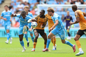 Brandon Thomas-Asante, left, battles with former Albion colleague Semi Ajayi, now of Hull. Thomas-Asante has been in electric form for the Sky Blues of late. (PA)
