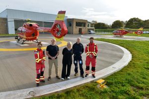 Midlands Air Ambulance at the new base, next to RAF Cosford. In red we have Paramedics: Fay Pollock and Chris Brooke, and with them: Former patient of the Air Ambulance: Glenn Richardson (lives near Lichfield), CEO : Hanna Sebright, and Pilot: Tim Jones..