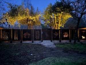 The new corten steel fence at Riverside House by Stourbridge Canal - which can be lit up at night with spotlights