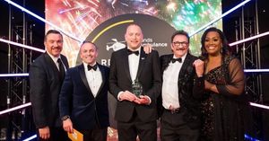 Tim Rowlands collected his award celebrating his achievements in the field. Pictured left to right: Ed James, Tim Rowlands, Paul Chuckle and Alison Hammond