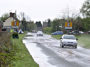 Supporting image for story: Road near Newport flooded by burst