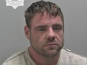 Supporting image for story: Police release photo of man wanted for a breach of bail conditions