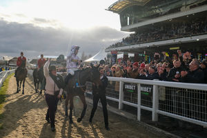 Lorcan Williams celebrates as he rides Golden Ace to win The Unibet Champion Hurdle Challenge Trophy during day one of the festival. (Photo by Alan Crowhurst/Getty Images)