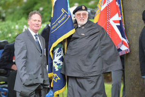 A standard bearer at the service.