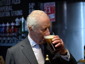 Supporting image for story: King pulls himself a pint during visit to family-owned brewery